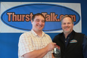 Dan Jones (left) and Martin McElliott display the New Business of the Year award from the Lacey Chamber.