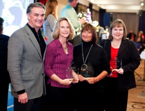 Lori Drummond (right) is pictured with other Providence Christmas Forest sponsors Ken and Nancy Anderson, Coldwell Banker Evergreen Olympic Realty and  Joyce Targus, Frost & Company. Photo courtesy: Providence.