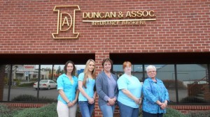 Five Duncan Insurance team members show support for World Autism Awareness Day (April 2) by wearing light blue.