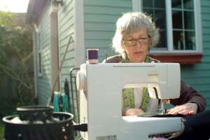 Diana Lynne Teachout finishes preparations on Procession Day. Diana and her extended family participate in the annual celebration every year. Photo by Emily Teachout.