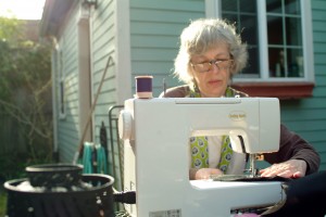 Diana Lynne Teachout finishes preparations on Procession Day. Diana and her extended family participate in the annual celebration every year. Photo by Emily Teachout.