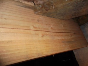 During the home inspection, I found this main beam with a crack in it.