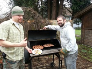 Brewer Brandon Brock (left) and Head Brewer Dave Pendleton prepare smoked bacon wrapped meatballs to pair with Dick's brews.