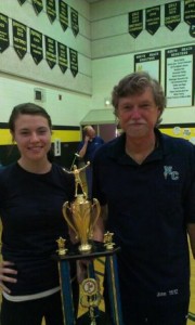 Coaches Jack and Sarah Lizee proudly holding up the first place trophy from the North Beach Tournament.