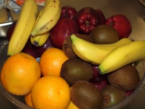 A variety of fresh fruits are available for children to select at each meal.