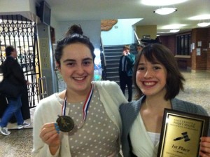 Capital High School Students Maria Kogan and Rachel Cumberland earn first place in a University of Puget Sound Debate competition.