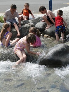 LOTT Kids play in East Bay Stream