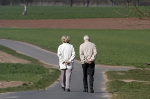 elderly couple walking