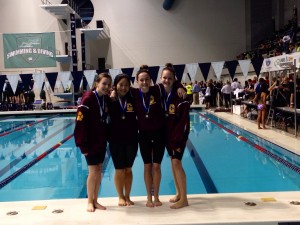 On Saturday, November 16, the Capital High School 200 yard freestyle team won the 2A state championship with a time of 1:43:35 at King County Aquatic Center in Federal Way.  The team is comprised of (l-r) Jessica Schulte, Jada Pearson, Jessica Eidenmuller and Madeline Hoffman.