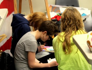 Students work diligently on their art finals to be presented at the end of the semester.