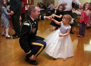 Kearen Feller dances with his delighted 4-year-old daughter, Skye Feller during the Daddy Daughter Dance hosted by Lacey Parks and Rec at The Lacey Community Center.