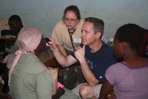 Olympia Ophthalmologist Jay Rudd performs an eye examination during a medical mission near Port Au Prince, Haiti in 2010 after a 7.3 magnitude earthquake devastated the nation.