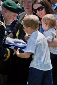 General Haas presents Mic with SSG Simpson's flag at Arlington National Cemetery on May 30, 2013.