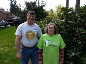 Tumwater Mayor Pete Kmet and a homeowner on National Rebuildling Day.