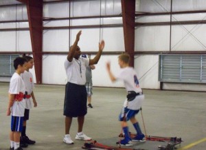 Coach Derrick Pringle works with area youth to develop skills on and off the court.