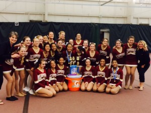 The Capital Cougarettes with coaches Jan Kiefer (left) and Jaci Gruhn at UDA Dance Camp.