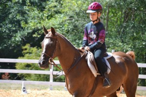 Boston Harbor resident, Kendall Hooper exercising with her new friend, Keev Farm’s 17 year old Arabian horse named “Billy”. © 2014 Keev Farm