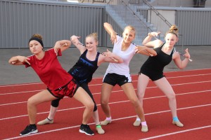 The Olympia High School baton twirling team poses for a picture. From left to right, they are Valea Highealge, Kirsadra Welsheimer, Natalie Jonen and Catiana Welsheimer.