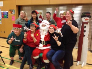 The annual Signing Santa event at Chambers Prairie Elementary School provides a day of fun and entertainment for deaf and hard-of-hearing children, their families, and the local community. Photo courtesy of Signing Santa