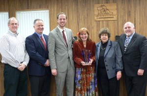 In the photo left to right- Jeff Wilson and Mark Barkley of the State Commerce Department, Xandre Chateaubriand, Commissioners Karen Valenzuela and Cathy Wolfe and Lon Wyrick