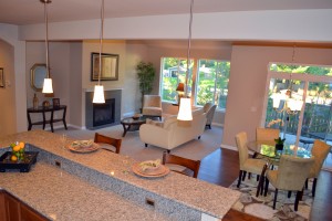 Open concept dining rooms are popular for more casual dining and family gatherings like the Spruce plan at Evergreen Heights.