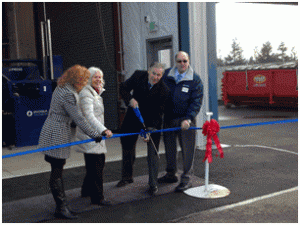 Governor Jay Inslee cuts the ribbon to the Port’s  new Industrial Stormwater Treatment Plant on Dec.3,  2014, with Dept. of Ecology’s Heather Bartlett and  Port Commissioners Sue Gunn and Bill McGregor.  