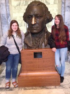 Our Australian foreign exchange student Leah and I take a picture with the George Washington bust in the Olympia Capitol building.