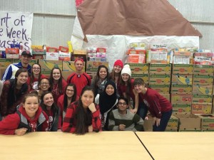 North Thurston High School students exhibit their school pride with the food they collected during the county-wide food drive. 