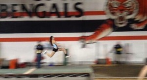 Peyton Russell flies through the air during the triple jump during the 2014 Simplot Games.