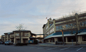 The Port is moving its core functions and real  estate operation from one building and three  trailers at two locations to Percival Plaza (above  right) in downtown Olympia.  