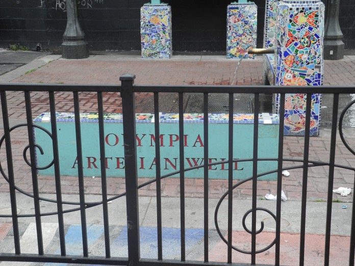 The City of Olympia Artesian Commons Well with fence by Garys Garden Gate-min artesian well