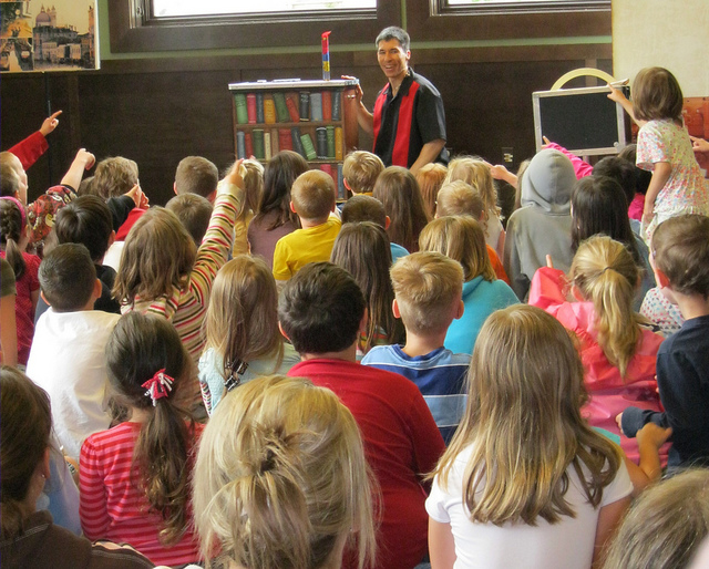 Summer Reading at TRL kids attend magic show library summer reading