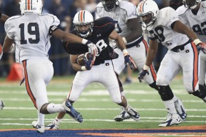 Lawyer Tillman carries the football during an Auburn practice . Tillman was named Auburn’s Scout Team Player of the Year in 2014.