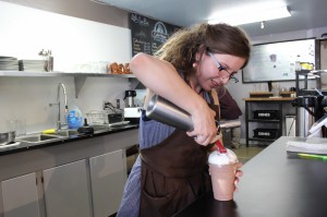 Barista Bri Gilfilian has been serving up a lot of chilly drinks at Hawthorne Coffee this summer. They have a menu of blended drinks to help customers beat the heat.