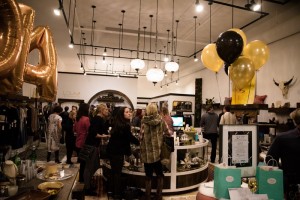 The festive atmosphere at Sip and Shop includes fine wines, music and food.