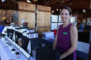 Leslie McNeilus, proprietress of Pure Luxe Apothecary, loves meeting new customers at the Olympia Farmers Market.