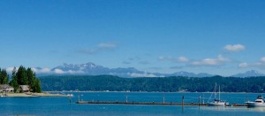 While gazing at the Olympic Mountains, take in bites of deliciously prepared, succulent meals. Photo credit: Douglas Scott.