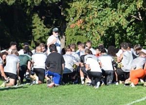 New Timberline Coach Mike Spears addresses the Blazers following the squad’s first practice. 
