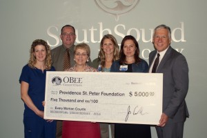 OBee Credit Union presents a $5,000 check to the Providence St. Peter Foundation in support of Every Woman Counts. Pictured from Left to right: Jennifer Cokl, South Sound Radiology; David Stagnone, M.D., South Sound Radiology; Stephanie Dirckx, South Sound Radiology; Andrea Potter, Providence Regional Cancer System; Kasia Konieczny, Providence Regional Cancer System; Lee Wojnar, O Bee Credit Union