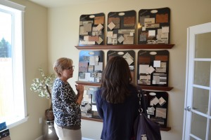 REALTOR® Vonna Madely works with a buyer to select finishes for their new home.