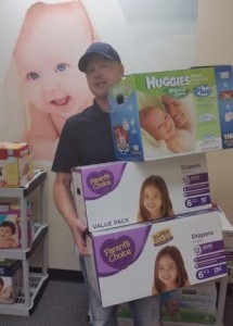 Benson grew up in a family of six brothers and two sisters and has young children of his own. He knows the importance of having a supply of diapers in the house.