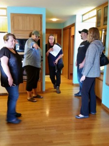 SSIM members evaluate potential home modifications for home in West Olympia.