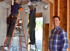 Matt Jones, new construction project manager for Sunset Air at the Rob Rice Community of Campus Peak during an install of the heating system.