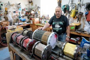 Ken Nelsen's over-sized rock tumblers are center stage in his workshop.