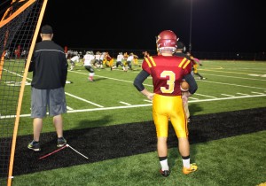 Capital's steady kicker waits on the sideline until he gets an opportunity to punt.