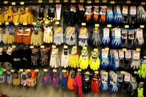 Gloves, gloves and more gloves can be found in the back section of Olympia Supply with sizes from kid to dad.