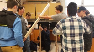 Students in the Science and Engineering club, run by Mr.  Beeson, work together during a late start Wednesday club meeting.