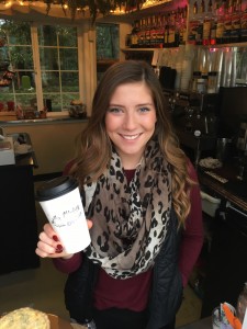 Roddie Giroux presents a fresh drink to a customer at Madre's Coffee where she earns spending money as well as helped pay for her summer trip to Europe. 