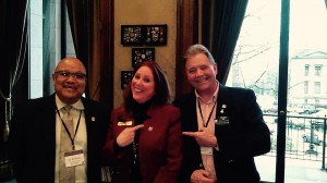 WA Secretary of State Kim Wyman (center), with Thurston Realtors Jim Simmons (l) and Greg Moe (r) points to a Realtor pin during their visit. Photo cedit: Bobbi Kelly