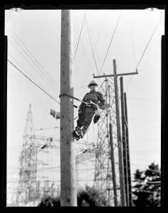 Shannon Fitch is a journeyman lineman for Seattle City Light and appears in the Galerie Fotoland's newest exhibit at Evergreen State College. 